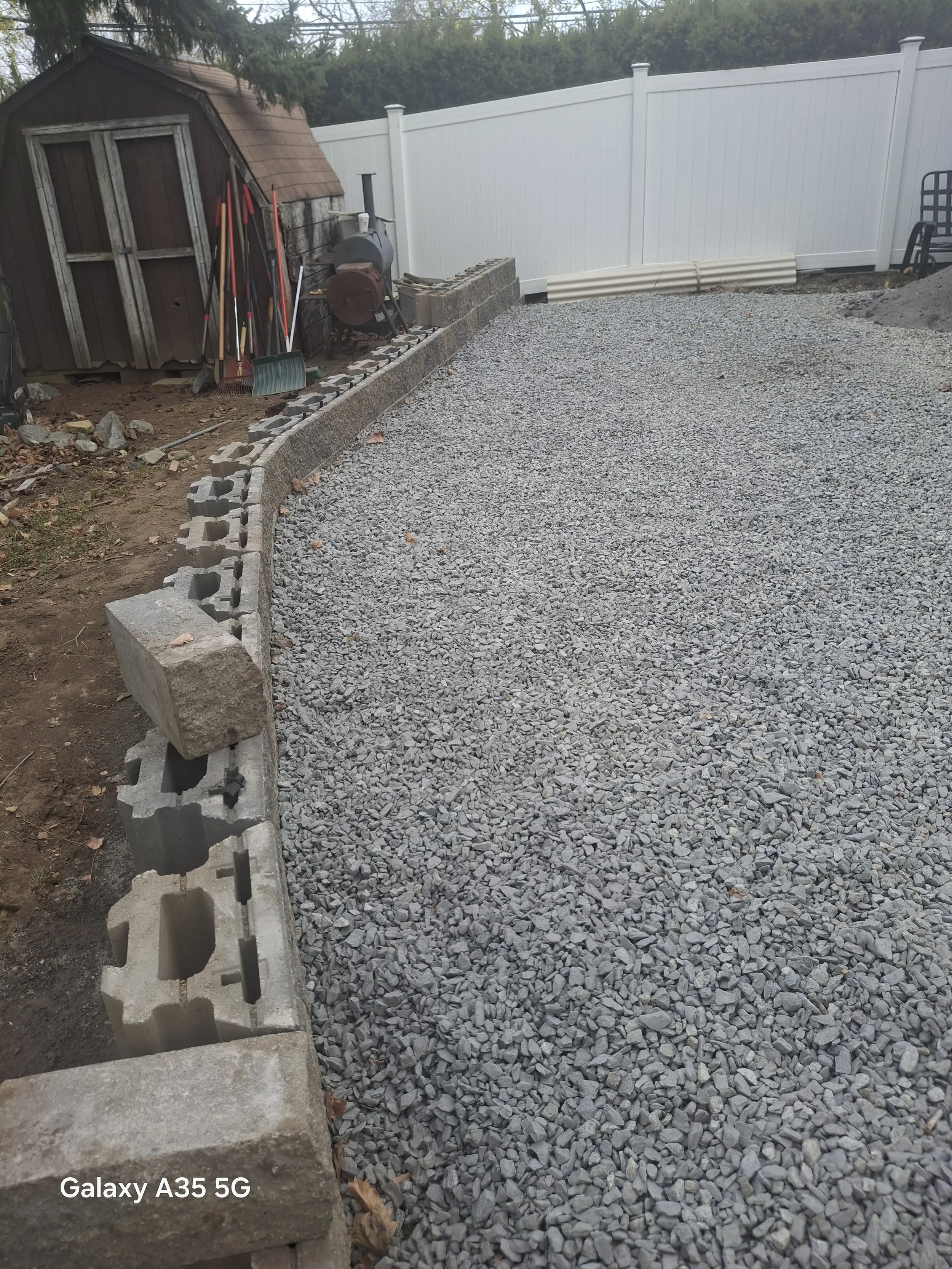 Patios with retraining wall at trapelo rd Waltham