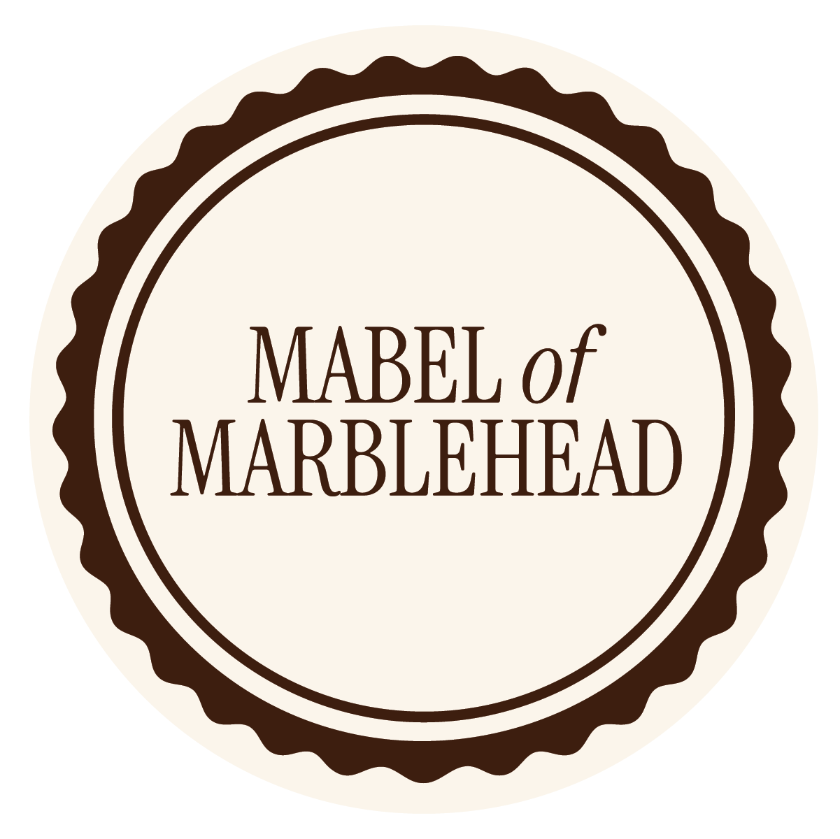 Product label reading 'Mabel of Marblehead' with a circular, scalloped brown border on a cream background.
