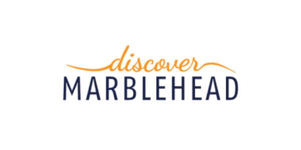 Colorful logo with the words "Marblehead" in bold, dark blue letters and a stylized orange mountain-like shape above the text.