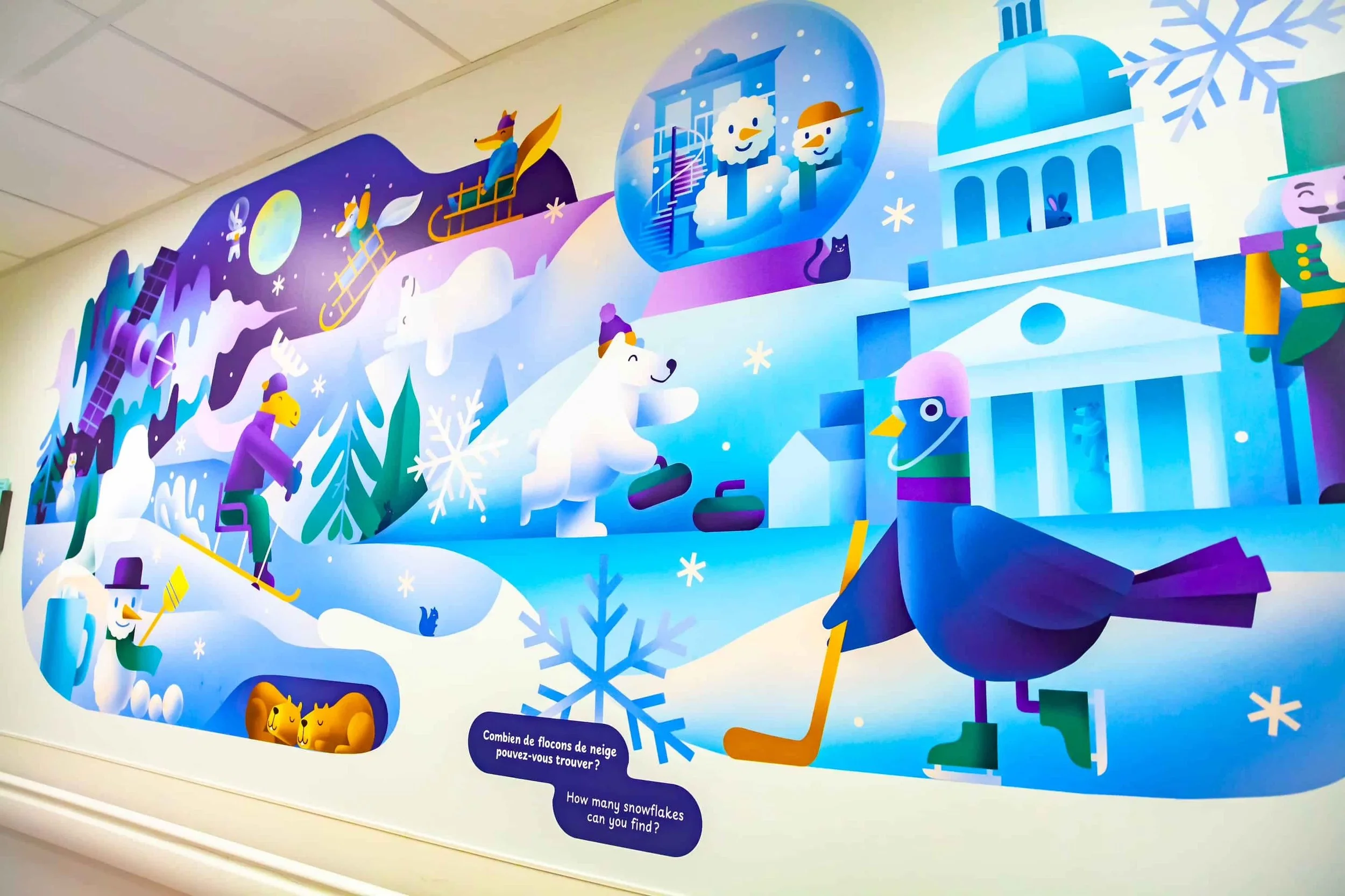 Colorful winter-themed mural with animated animals and children playing in the snow, featuring a polar bear, ducks with a hockey stick, penguins, snowflakes, a snow dome with ice skaters, a castle, and a large bird with green boots, with a question in French and English asking how many snowflakes can be found.