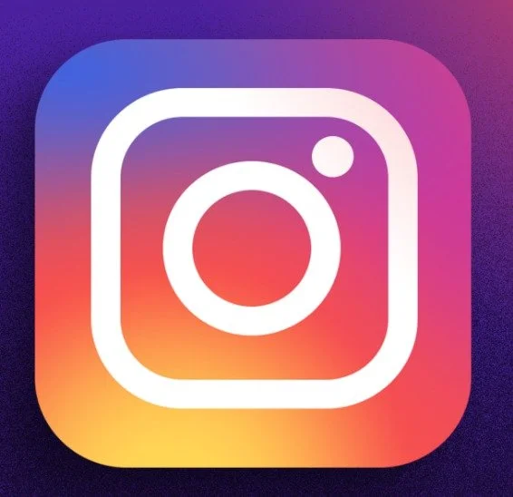 Instagram app icon with a gradient background of purple, pink, orange, and yellow, and a white outline of a camera.