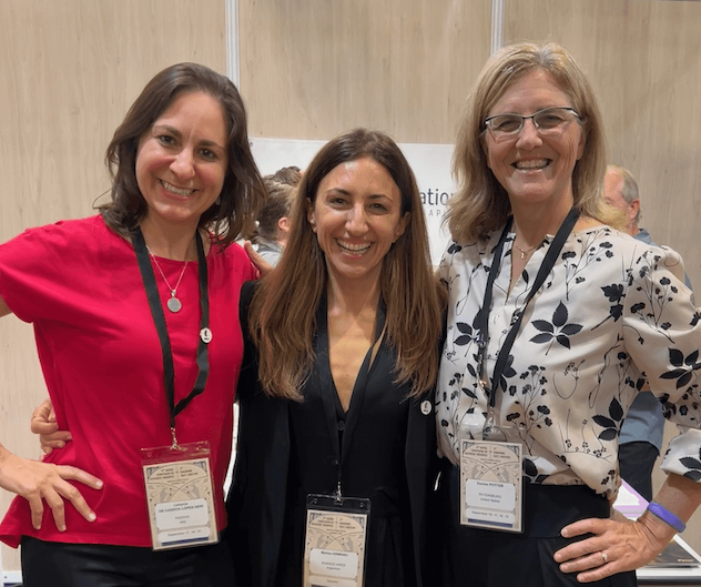 Denise with two of her team members.