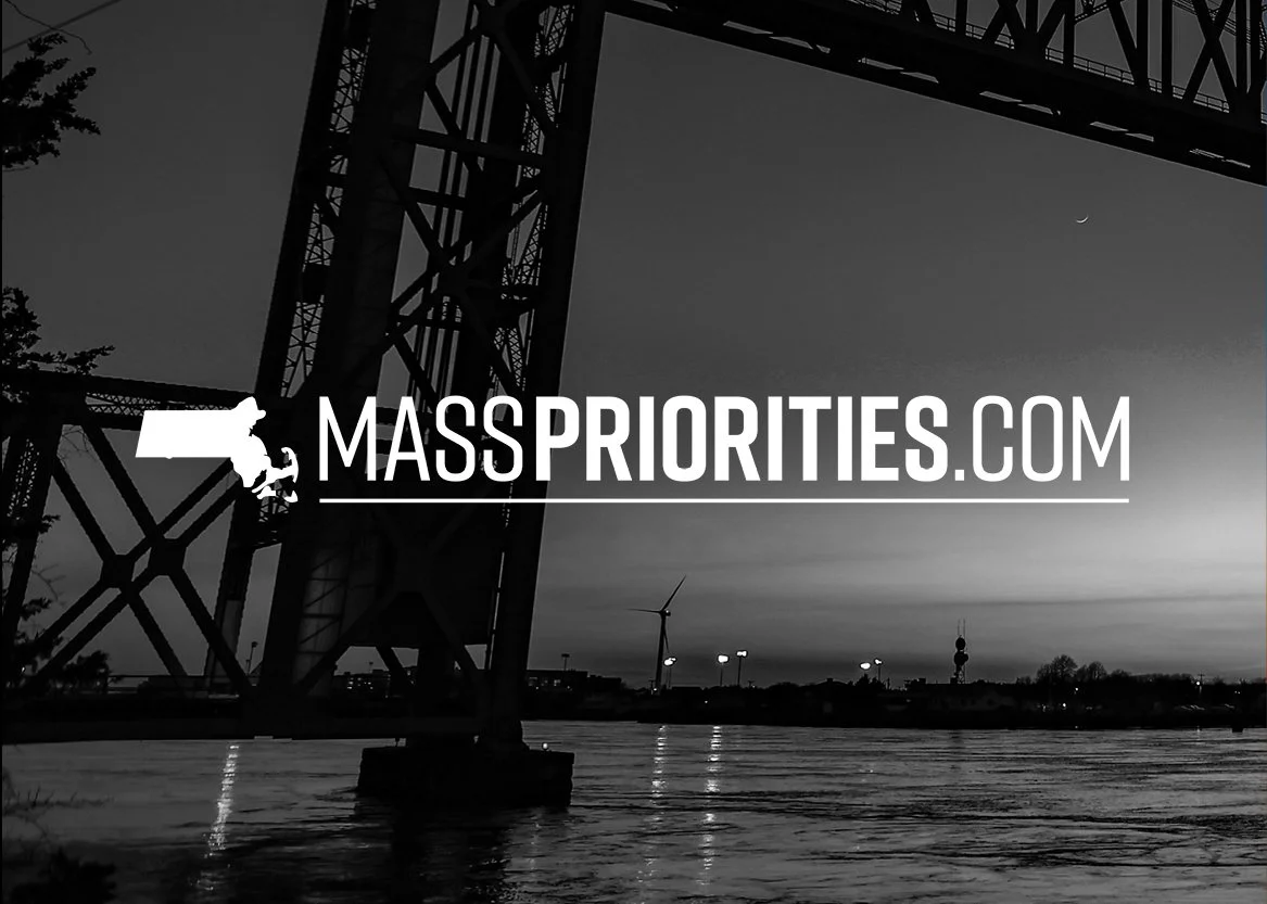 A black and white photo of a bridge over a river at dusk, with a floating logo of a person rappelling and the text 'MASSPRIORITIES.COM' in the center.