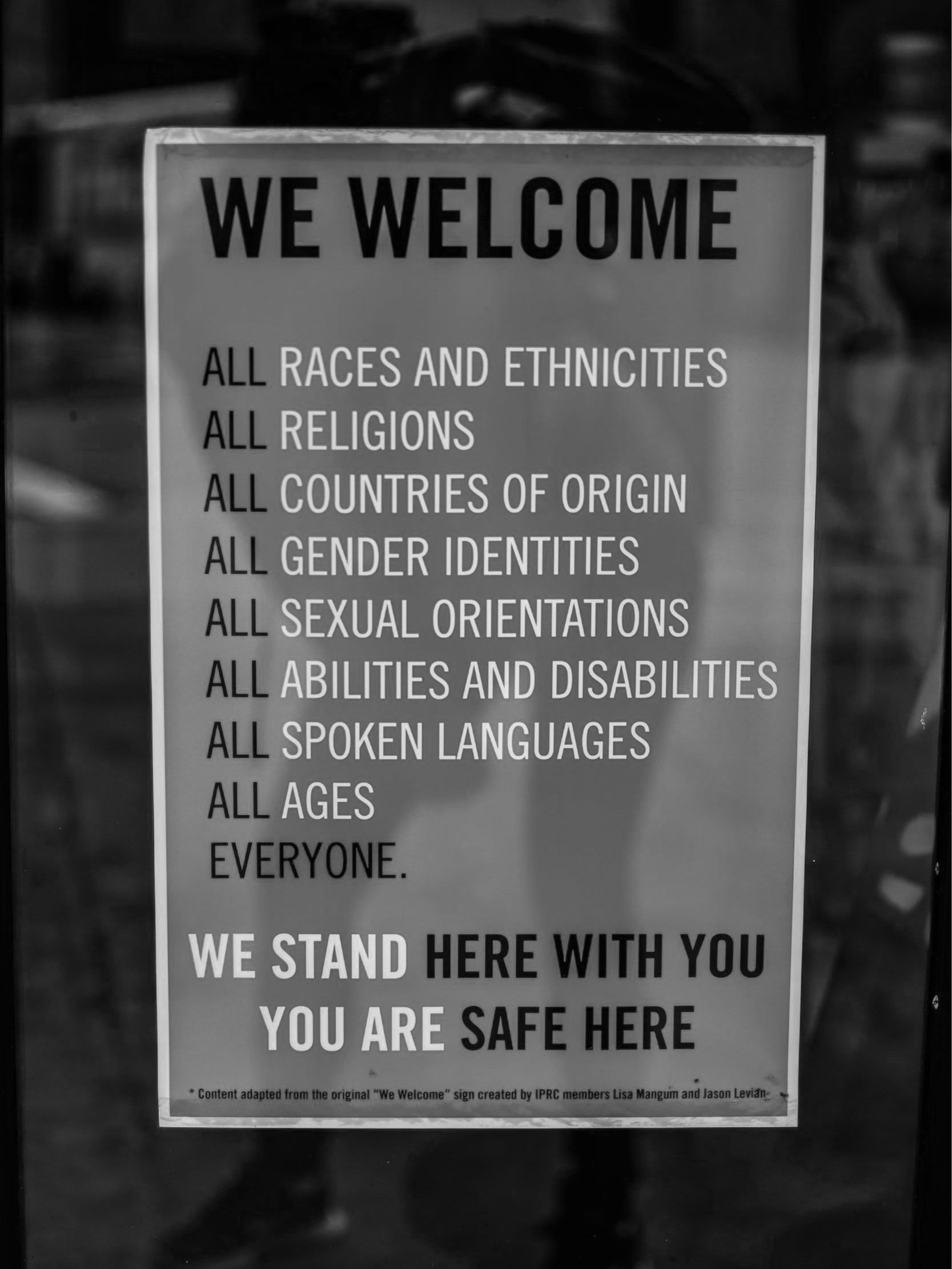 Sign that reads, We welcome all races and ethnicities, all religions, all countries of origin, all gender identities, all sexual orientations, all abilities and disabilities, all spoken languages, all ages, everyone. You are safe here.