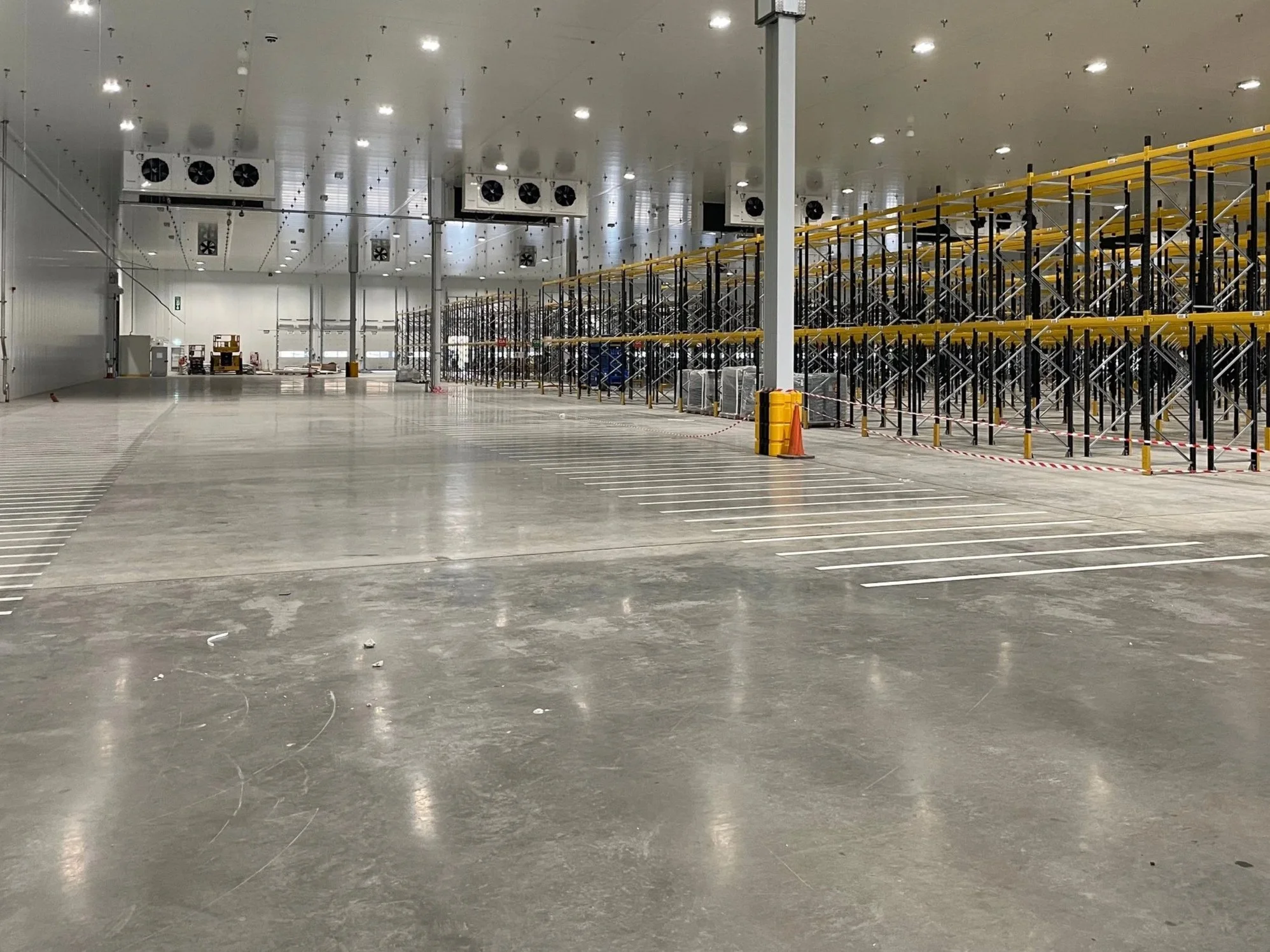 Grind and seal concrete floor in a Kansas City industrial warehouse by Precision KC Coatings