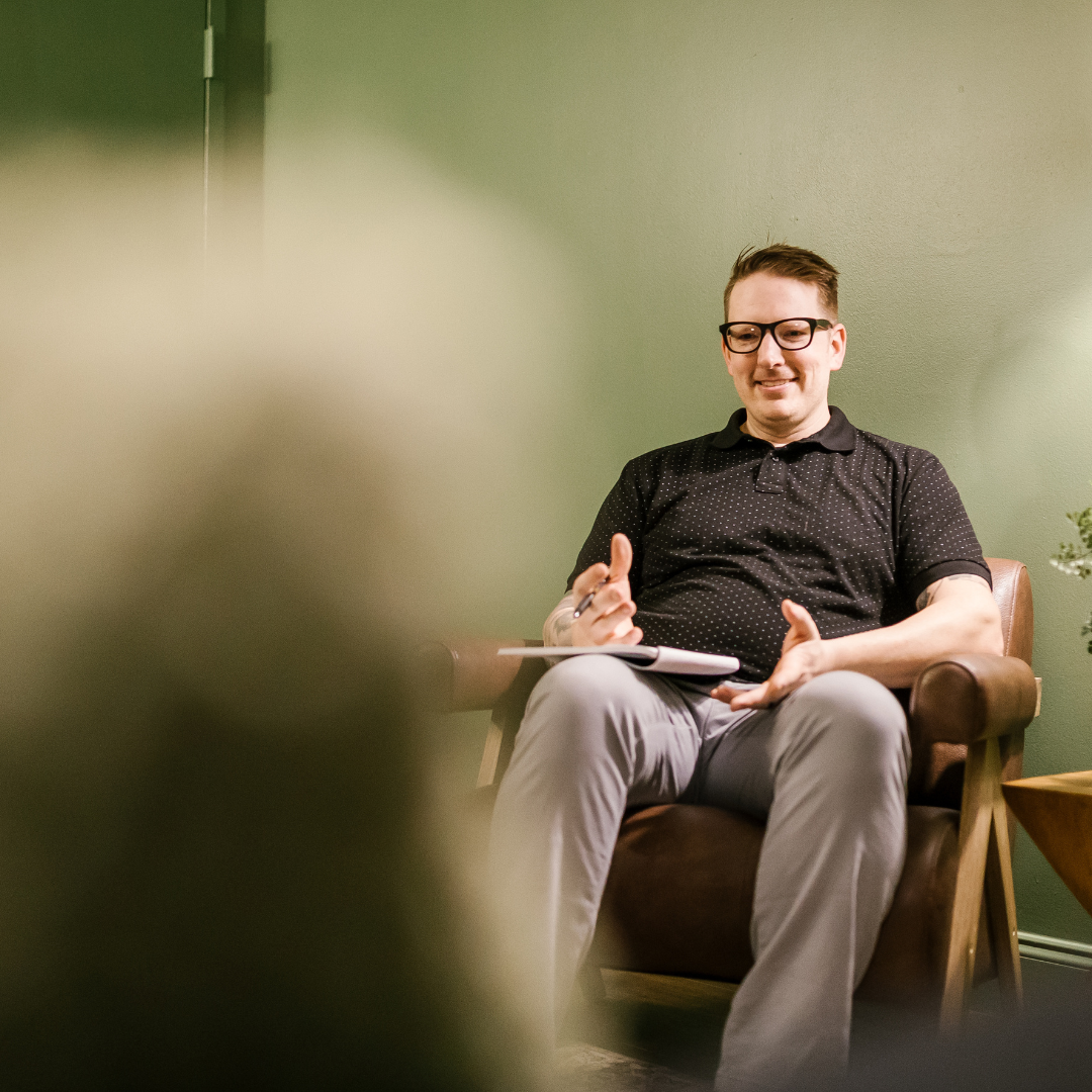 Therapist Max Eckerson during a counseling session at Restore Hope Counseling in Charlotte, NC