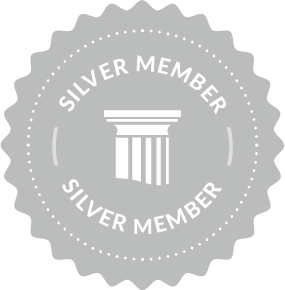 Silver membership badge with a pillar icon in the center, surrounded by the words 'Silver Member'.