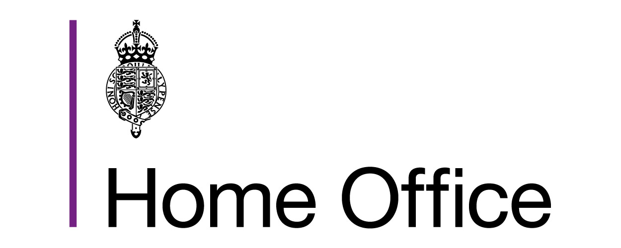 A home office sign featuring a government emblem with a crown and shield, with the words "Home Office" in bold text.
