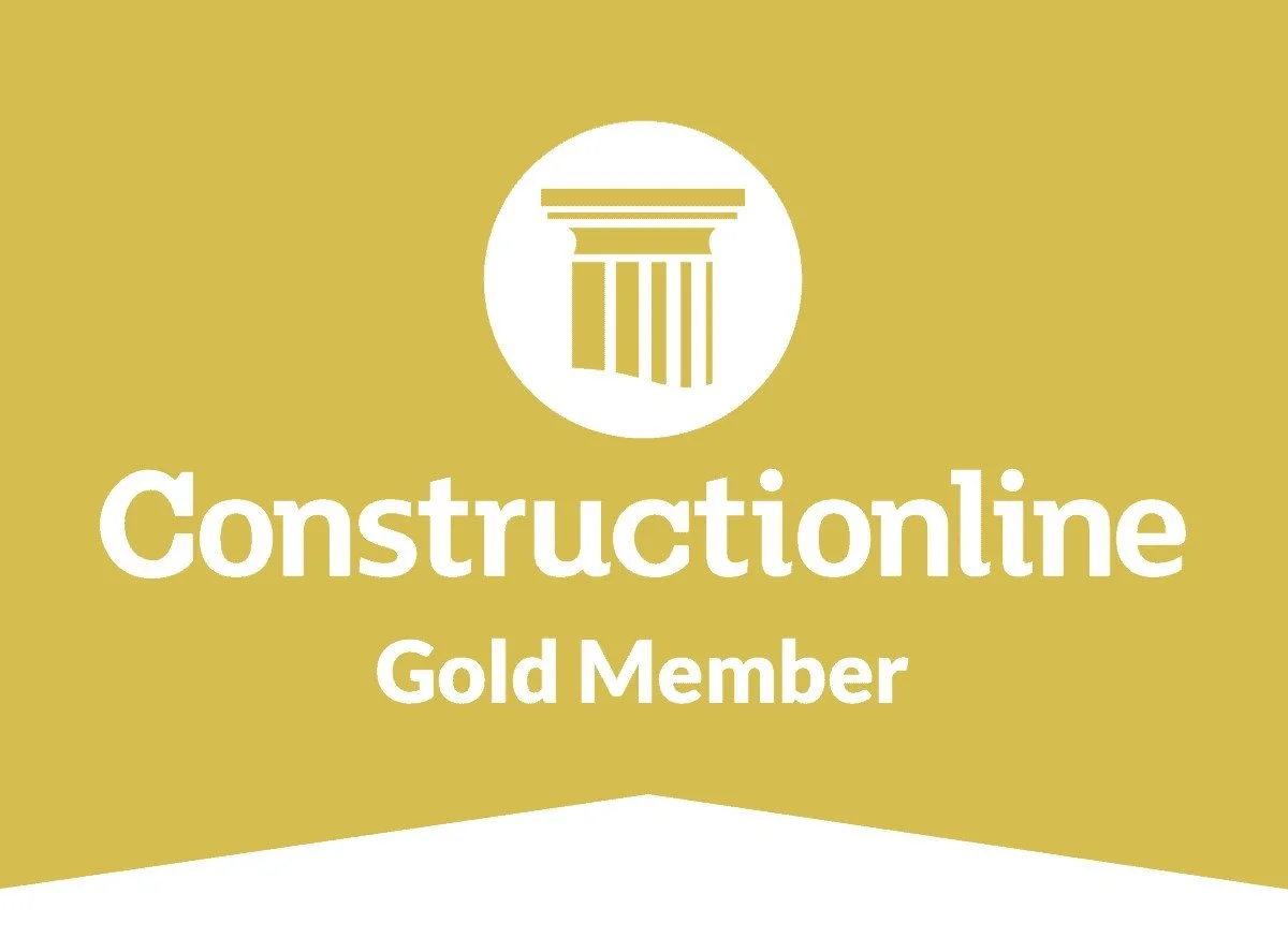Gold construction online membership badge with a classical column icon.