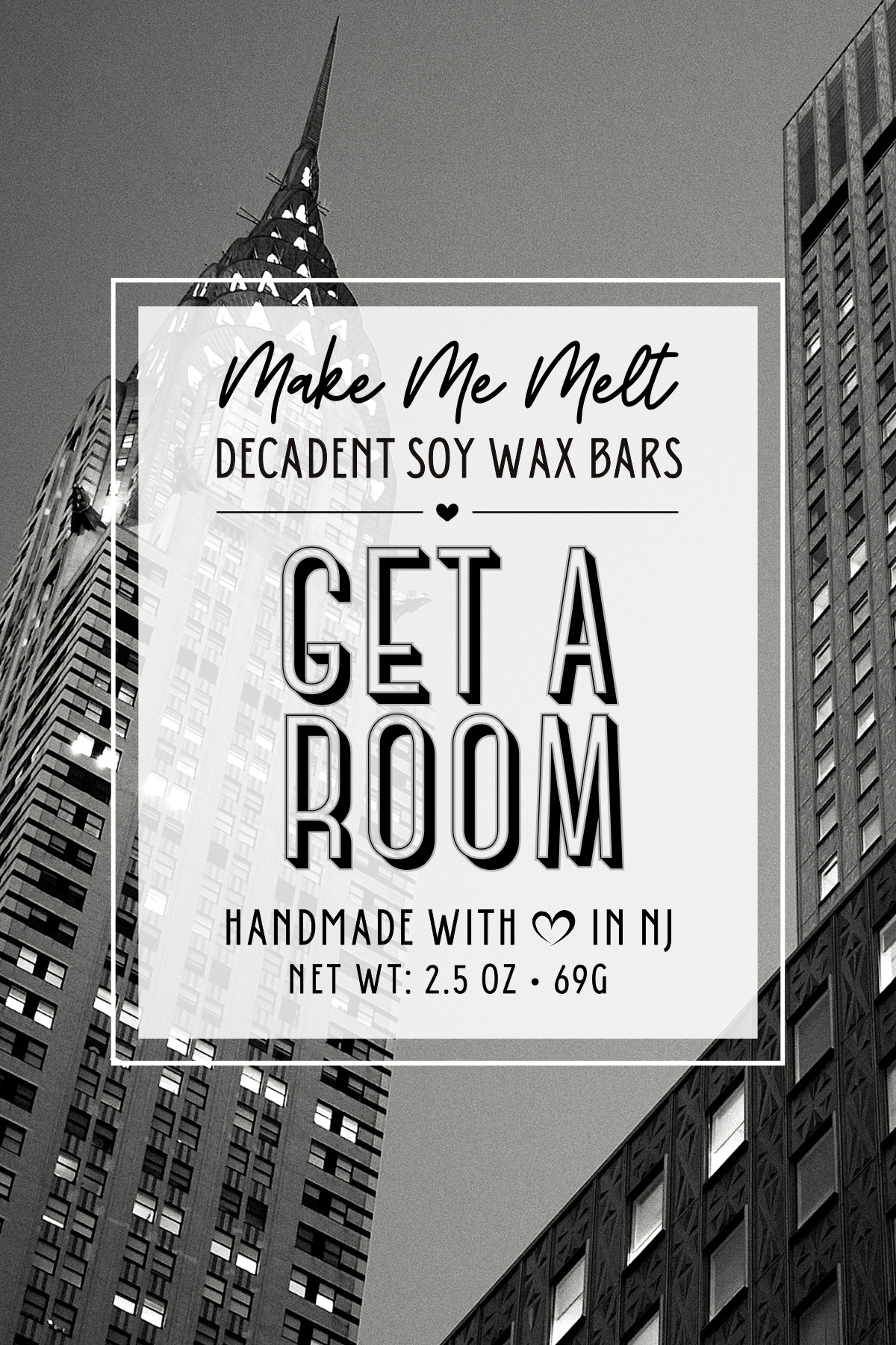 Black and white cityscape with tall buildings and a promotional sign for 'Make Me Melt,' a brand selling decadent soy wax bars, featuring a statement to 'Get a Room,' and indicating they are handmade in New Jersey with a net weight of 2.5 oz (69g).