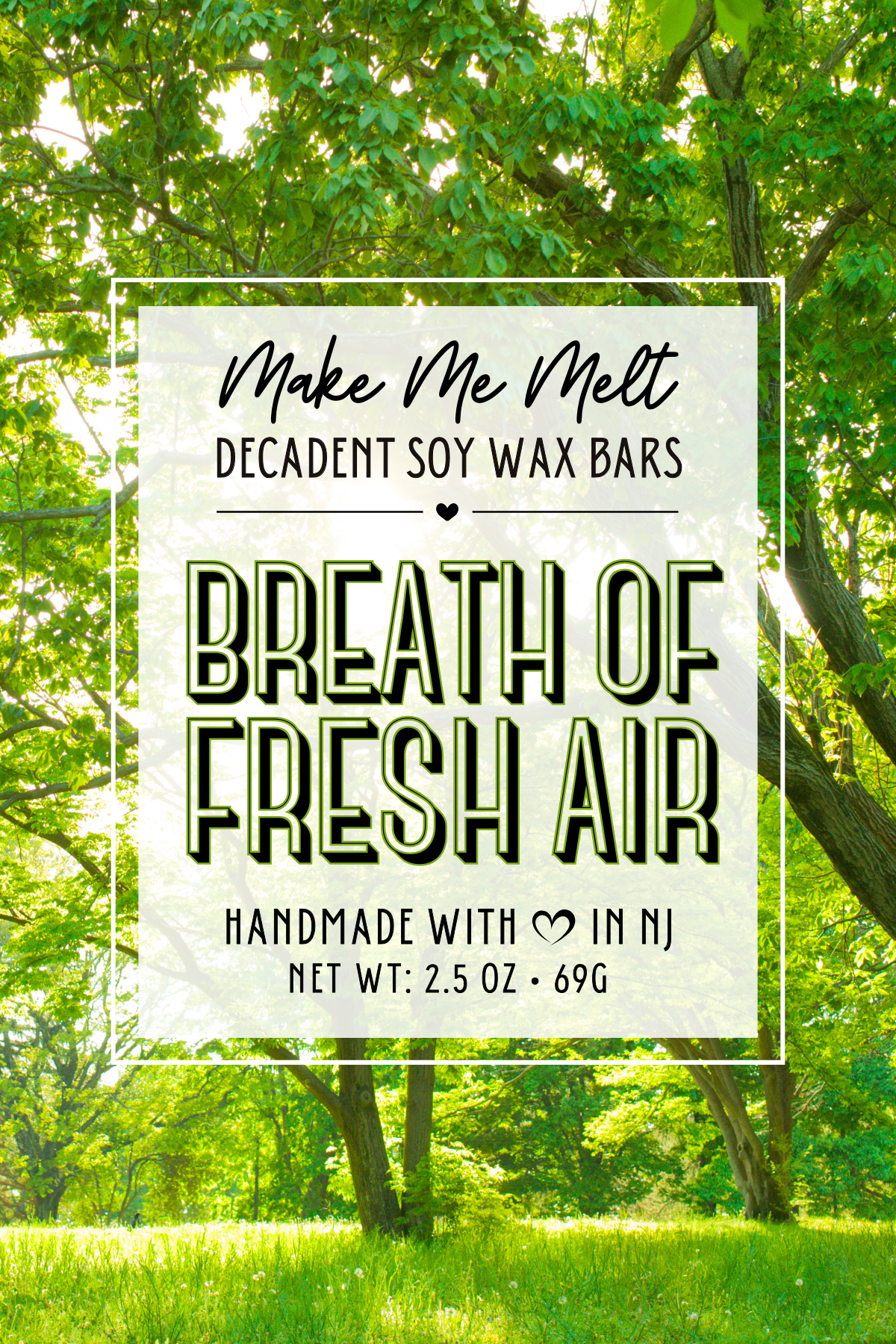 A label on a product package for 'Make Me Melt Decadent Soy Wax Bars' with the phrase 'Breathe of Fresh Air' in large, bold, green and black letters, set against a background of green trees and sunlight.