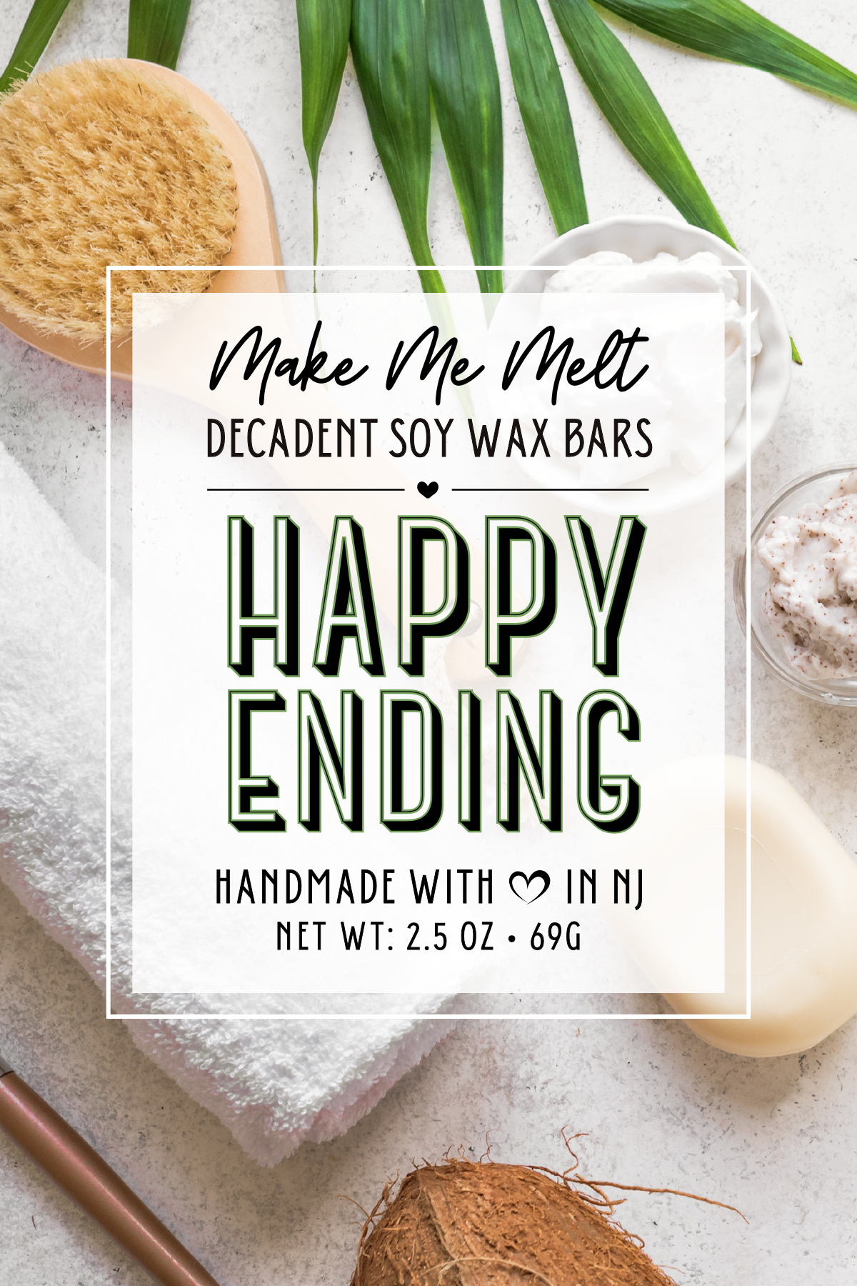 Packaging for Make Me Melt Happy Ending soy wax bars with soap, towels, and natural elements in the background.