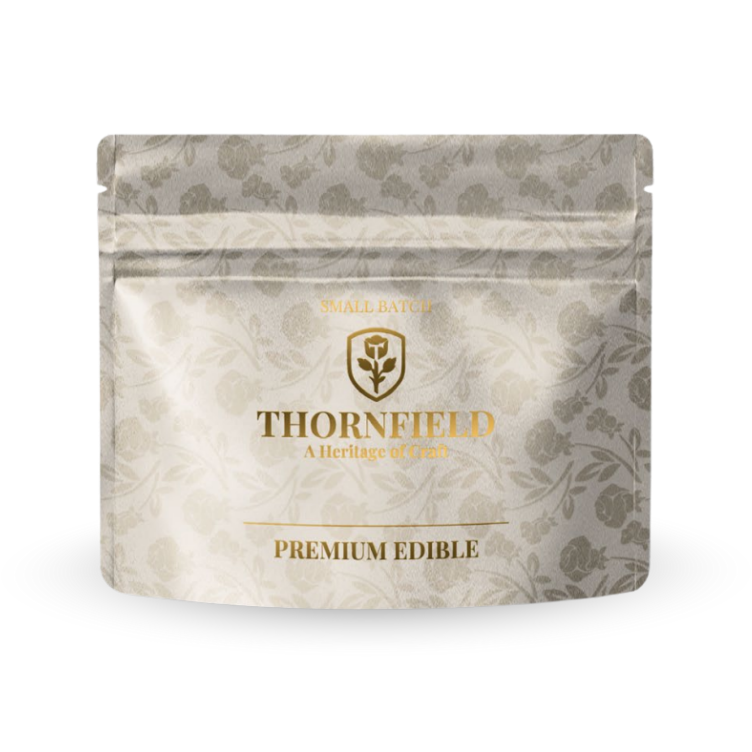 A package of Thornfield premium edible, small batch, with a herbal floral design on the white packaging.