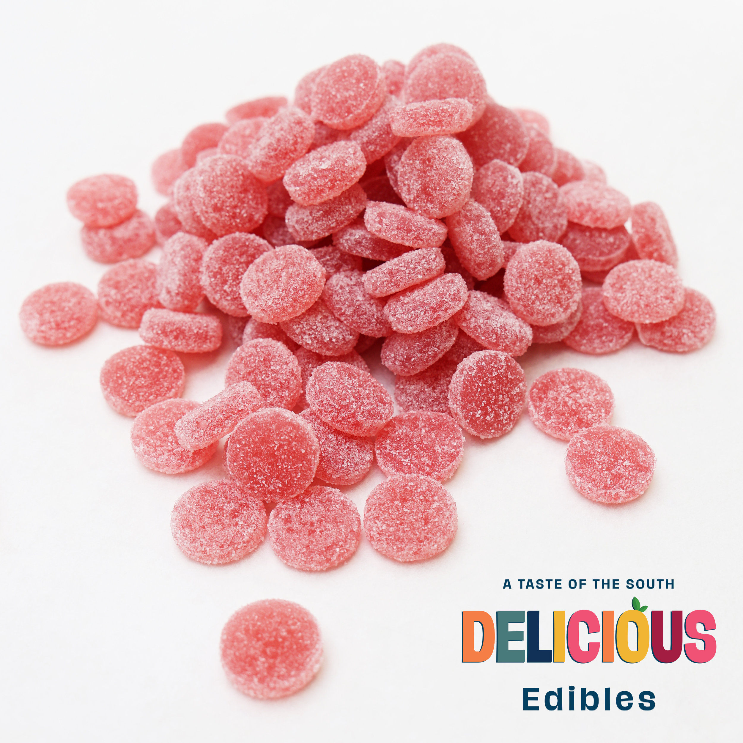 Pink gummy candies coated with sugar on a white background, with colorful text reading "A TASTE OF THE SOUTH DELICIOUS Edibles" in the bottom right corner.