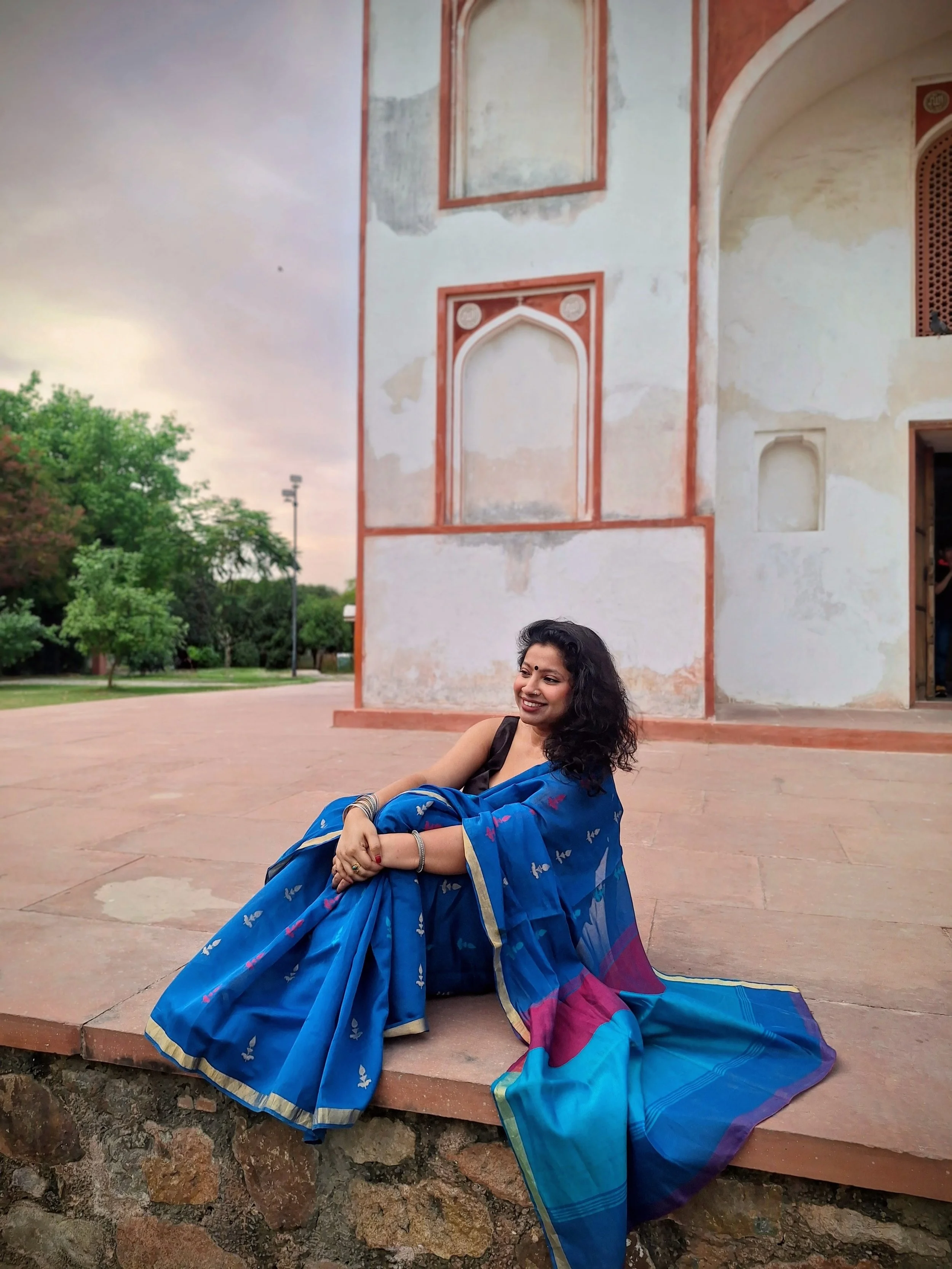 Dr. Pallabi Roy at a historic monument in Delhi, India