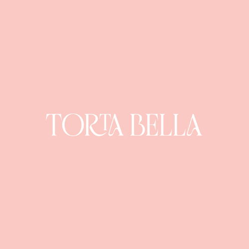 Pink background with white text saying 'TORTA BELLA'