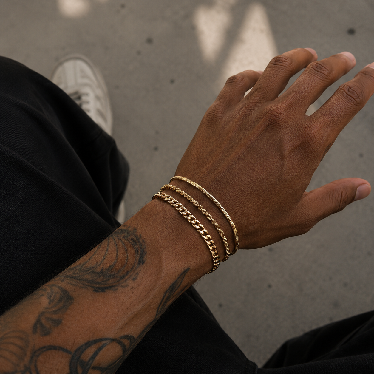 3 stacked bracelets.png