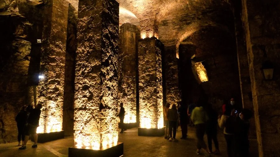 Down in the cellars of Société Roquefort, the decor is cathedral-like.