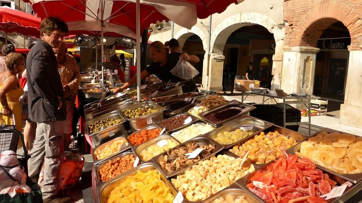 A stall mainly selling dried fruit at Revel market.