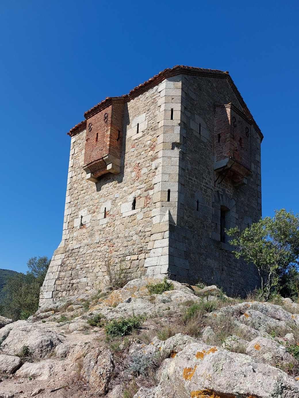 The Tower of the Burots (customs officials) sits astride the Franco-Spanish border at the eastern end of the Pyrenees.