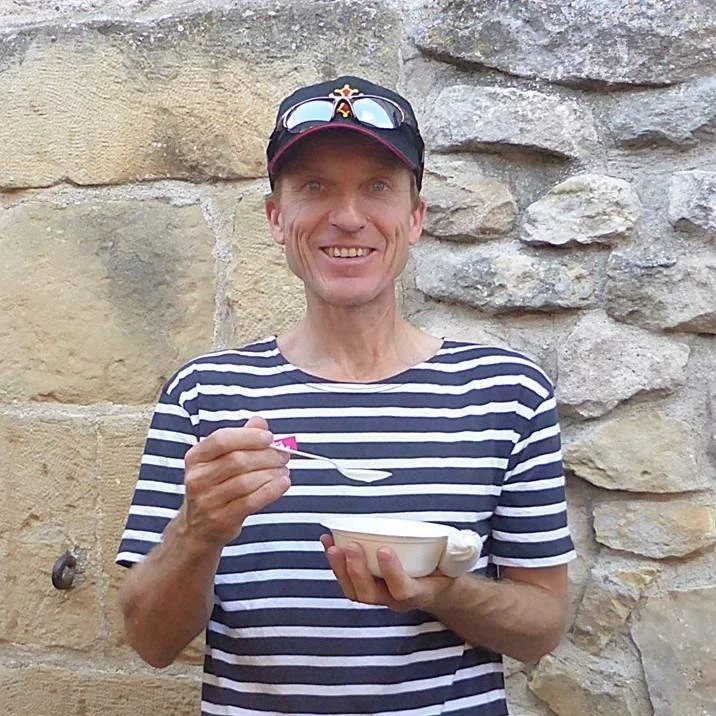 The author Colin Duncan Taylor enjoys a bowl of pink garlic soup at the Lautrec pink garlic festival.