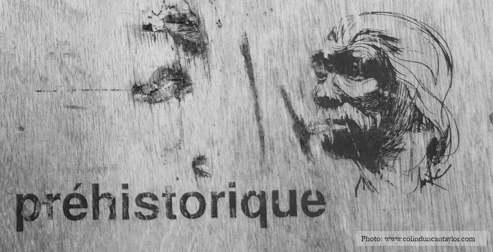 An image of Tautavel Man sketched on a sheet of plywood.