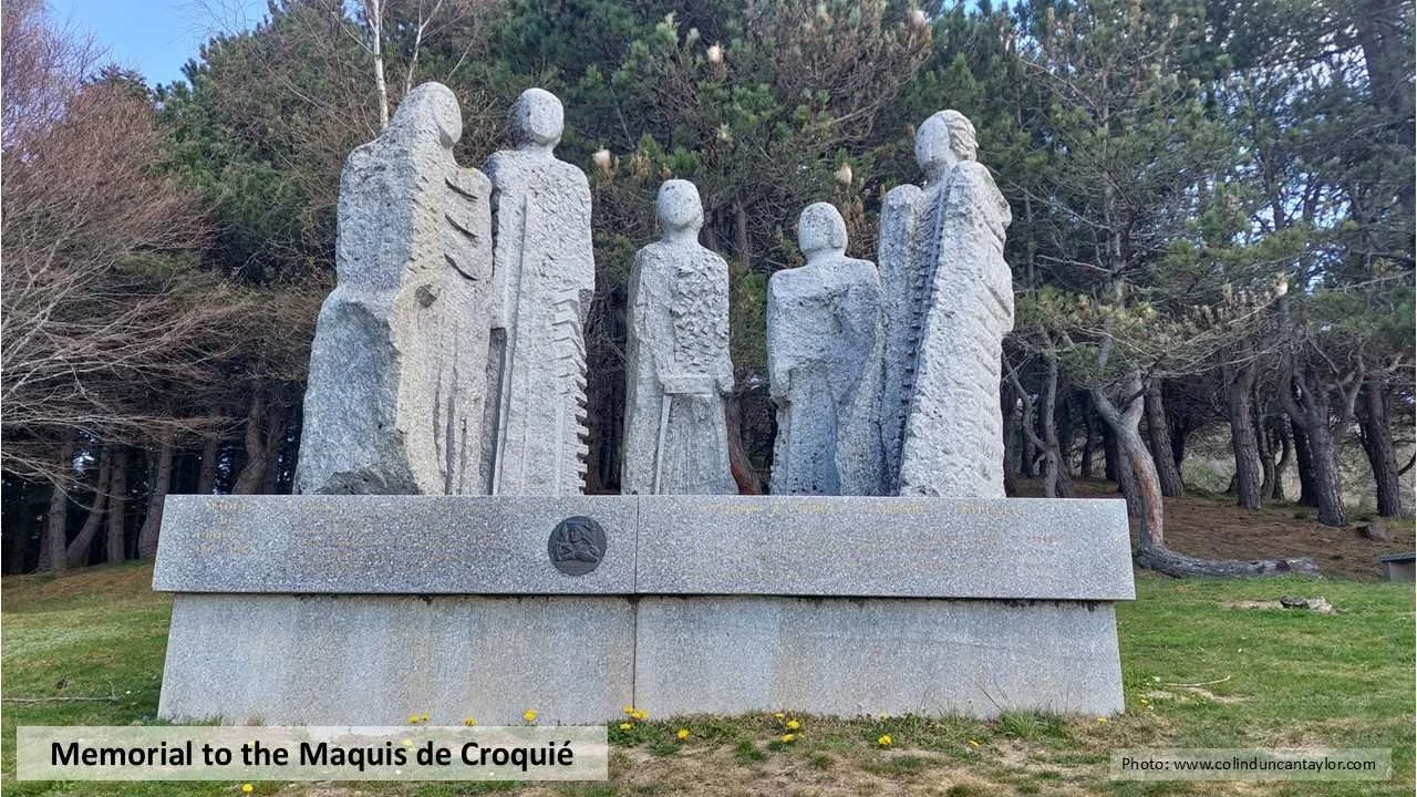 Granite figures sculpted by Ted Carrasco near Mercus in the French Pyrenees. Behind them are several nests of the processionary caterpillar.
