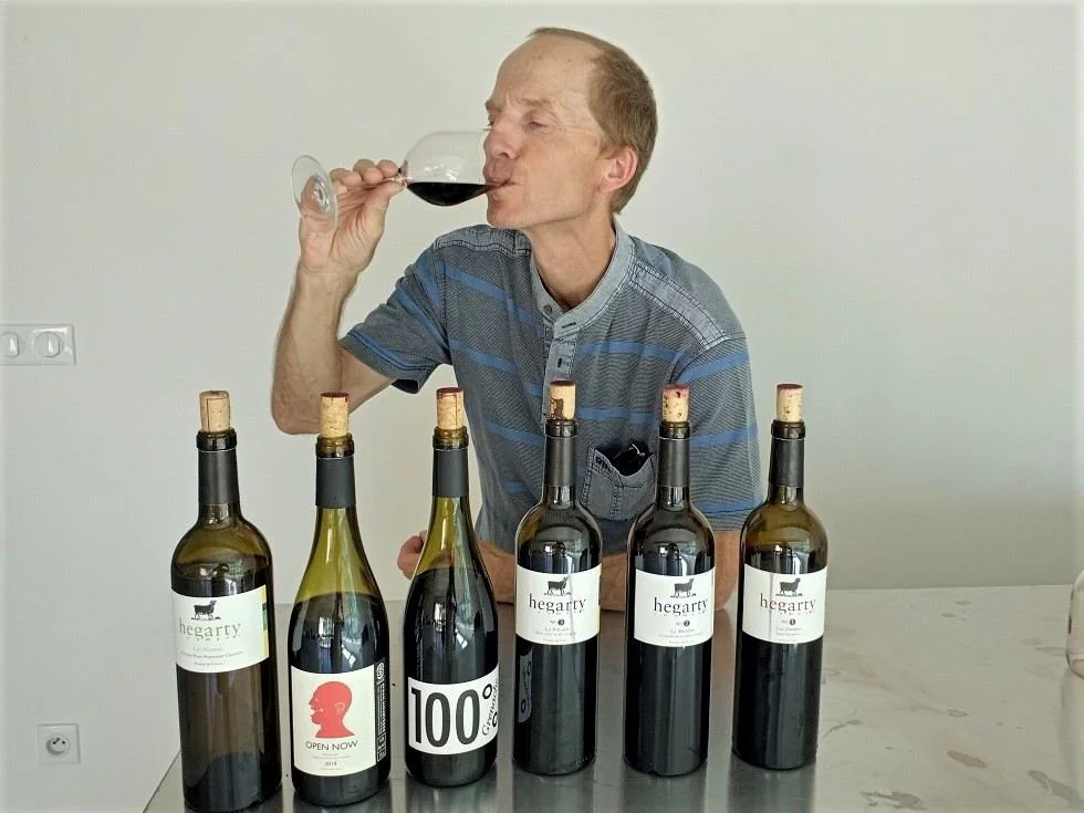 Author Colin Duncan Taylor samples biodynamic wines at the Hegarty winery in the Minervois.