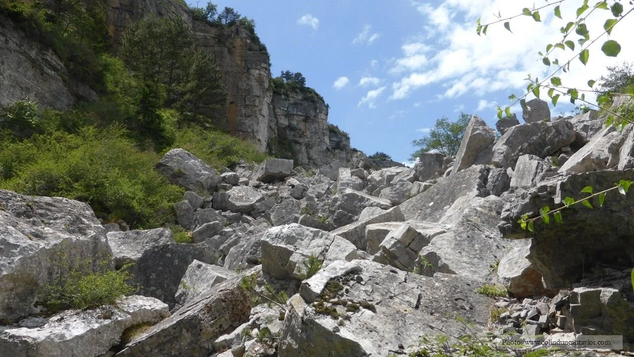 The path to the top of the Combalou is strewn with giant boulders.