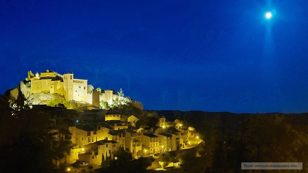 Alquézar by night: the fortress/church glows on its mount, while the medieval town slumbers at its feet.