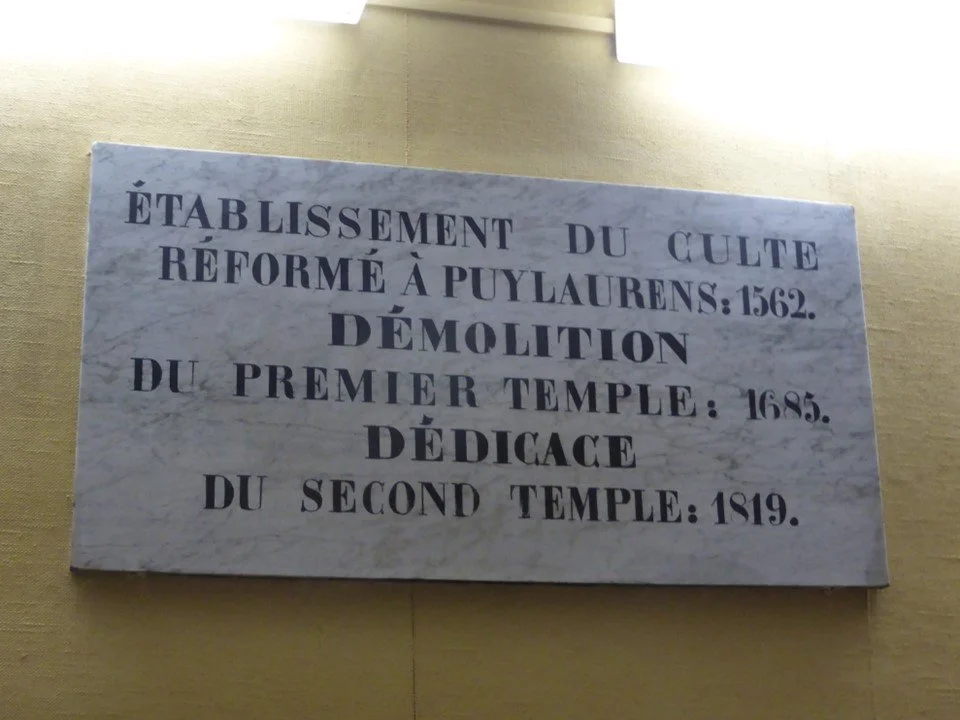 A plaque inside the Protestant church of Puylaurens, built in 1819.