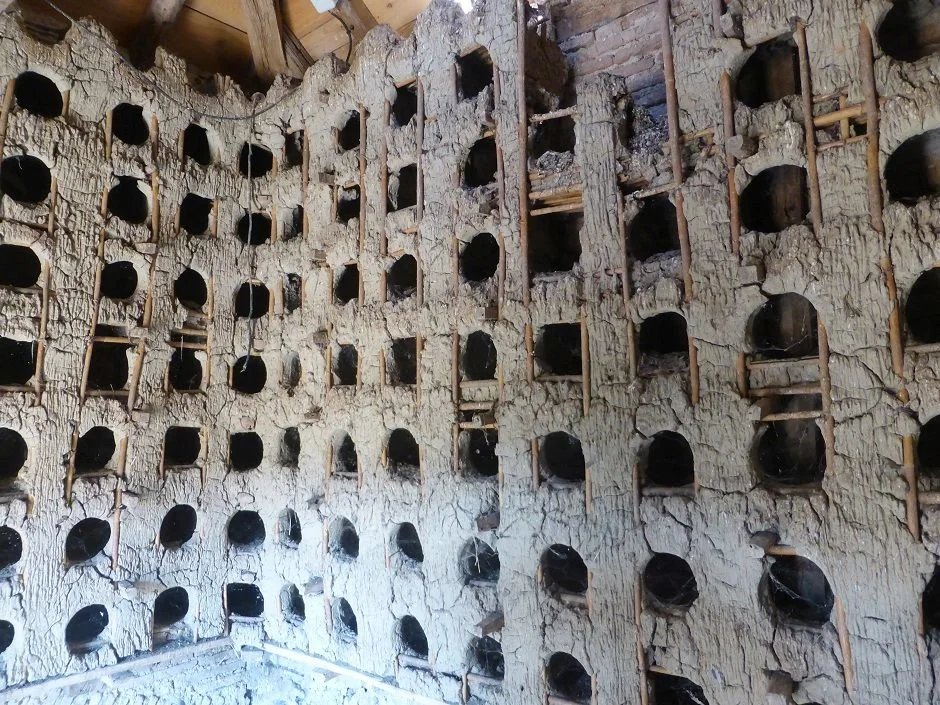 This pigeonnier, or dovecote, contains 300 pigeonholes or nesting niches fashioned from local clay and a bamboo framework.