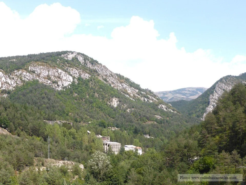 The Asland cement factory nestled in a wooded valley near La Pobla de Lillet.
