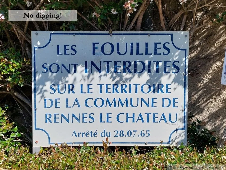 This sign in Rennes-le-Château forbids treasure hunters from digging up the village.