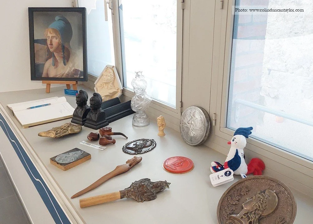 Various commemorative objects carrying the image of Marianne, symbol of the French Republic, displayed in the Marianne museum in Puylaurens.