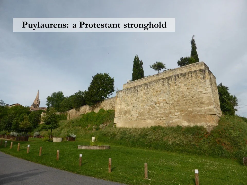 A surviving section of the town ramparts in Puylaurens.