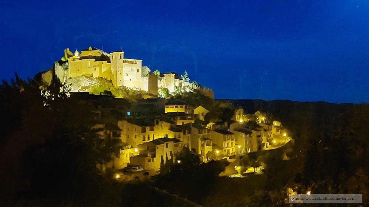 Alquézar at night: the fortress/church glows on its mount, while the medieval town slumbers at its feet.