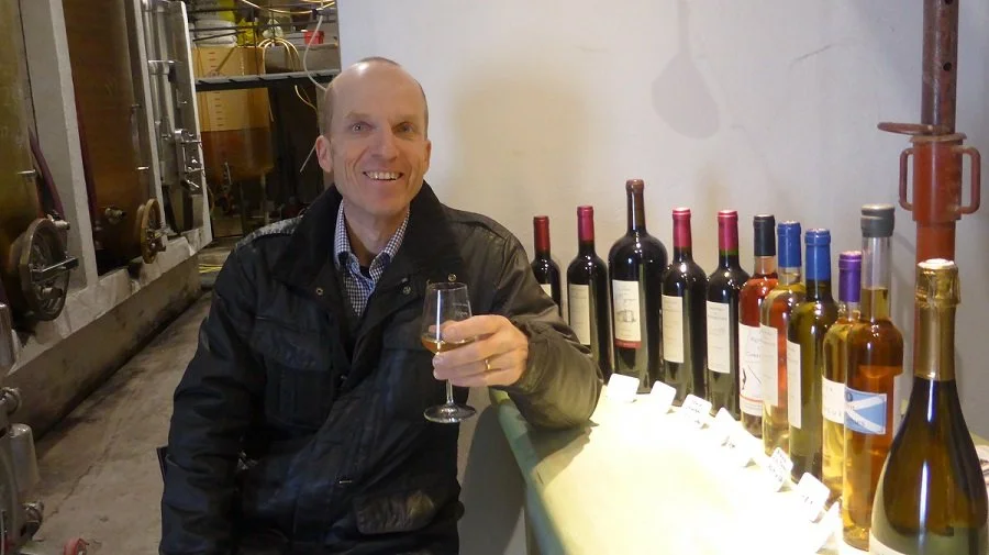 Author Colin Duncan Taylor samples biodynamic wines at Chateau de Mayragues.