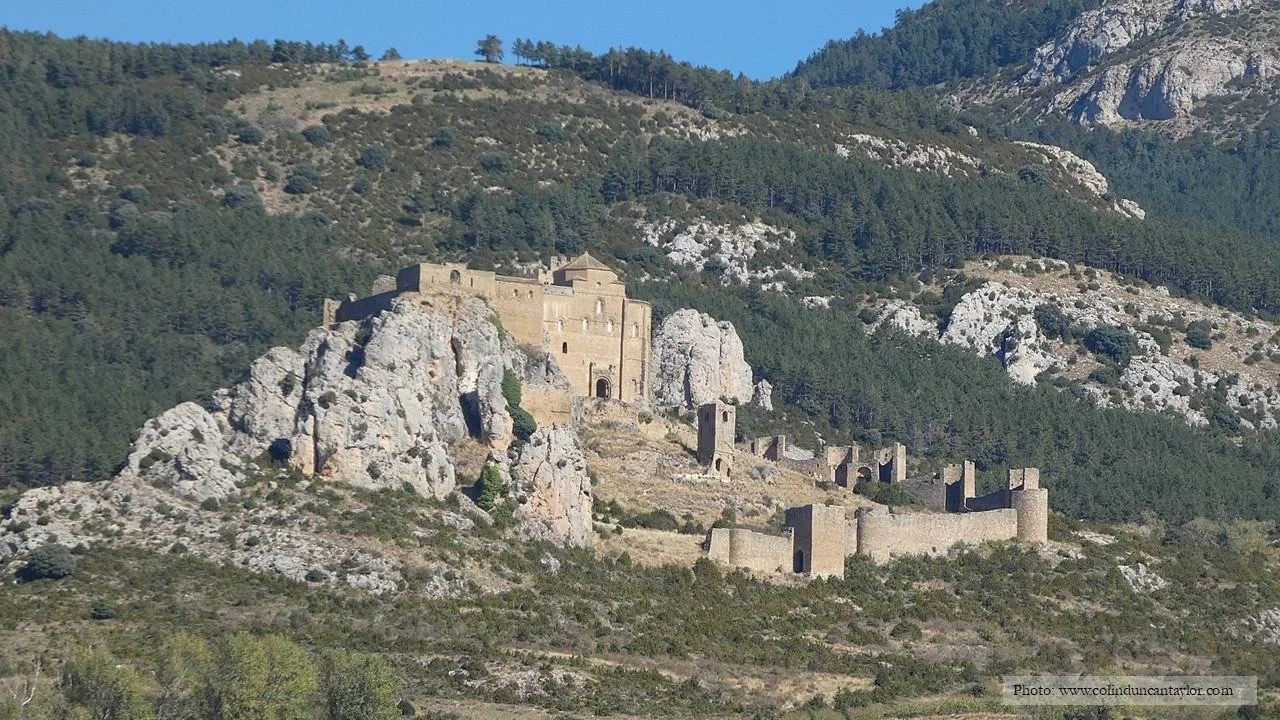 The Castillo de Loarre rises from a lump of limestone in the foothills of the Pyrenees.