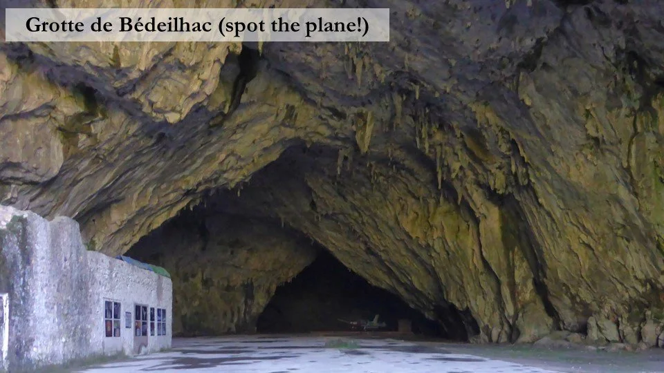 The entrance to the Grotte de Bédeilhac was paved in concrete by the German Luftwaffe in 1942. A light aircraft is just visible in the depths of the cave.