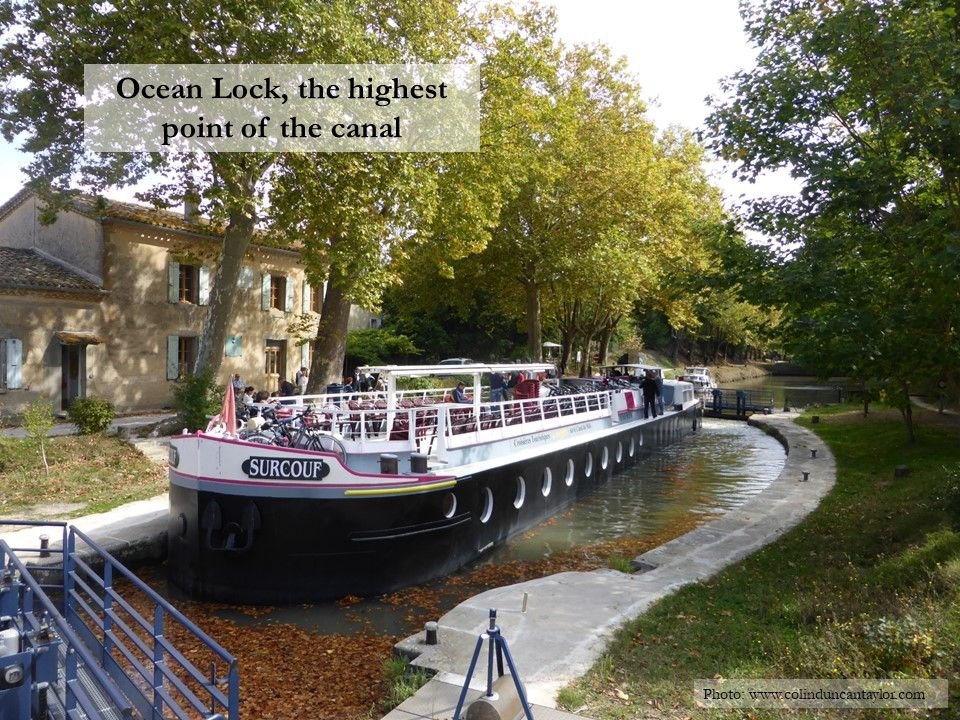 A barge passing through Ocean Lock, the highest point on the Canal du Midi.