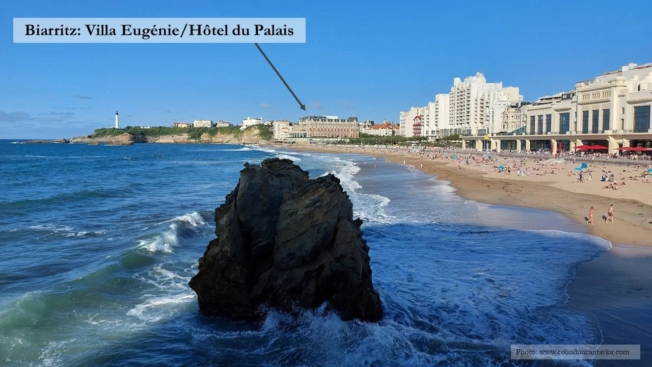 View of the seashore in Biarritz with the grandiose Hotel du Palais in the background.