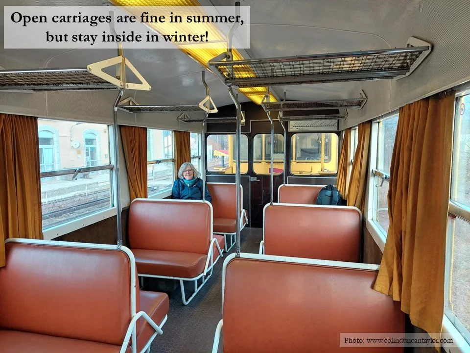 Inside one of the carriages of Le Train Jaune.
