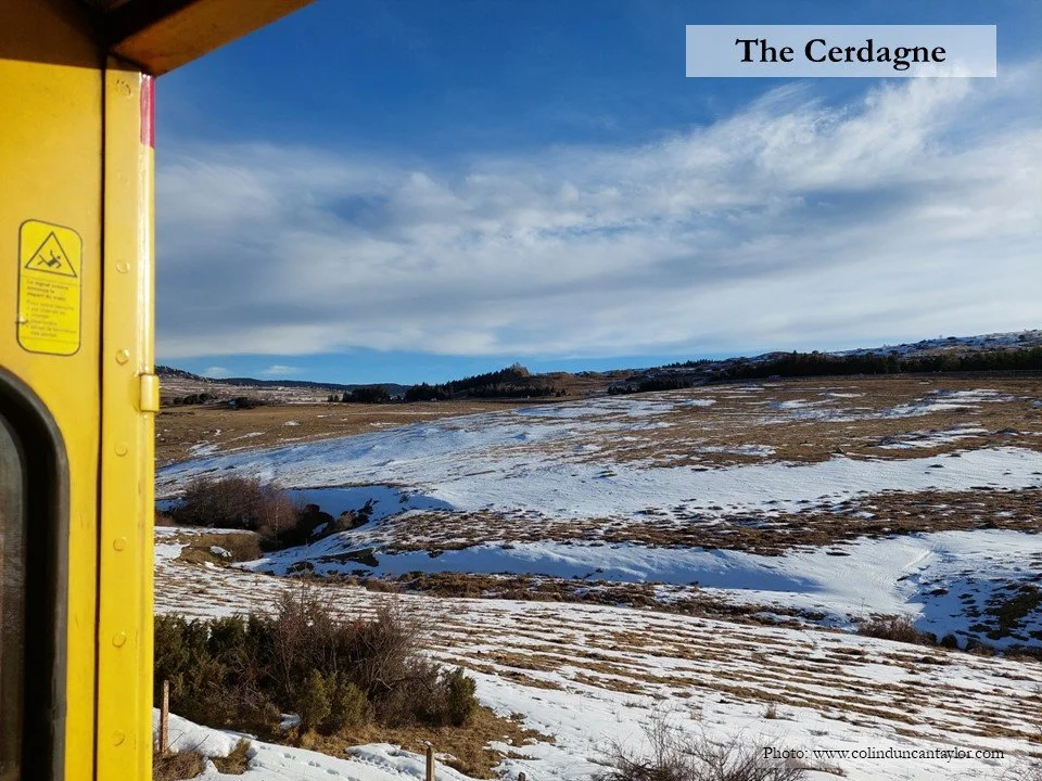 The snowy countryside of the Cerdagne in winter viewed from Le Train Jaune.