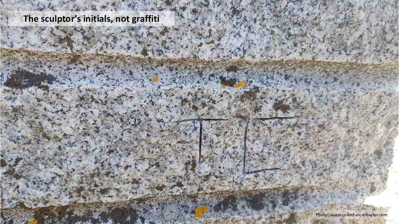 The initials of the sculptor Ted Carrasco.