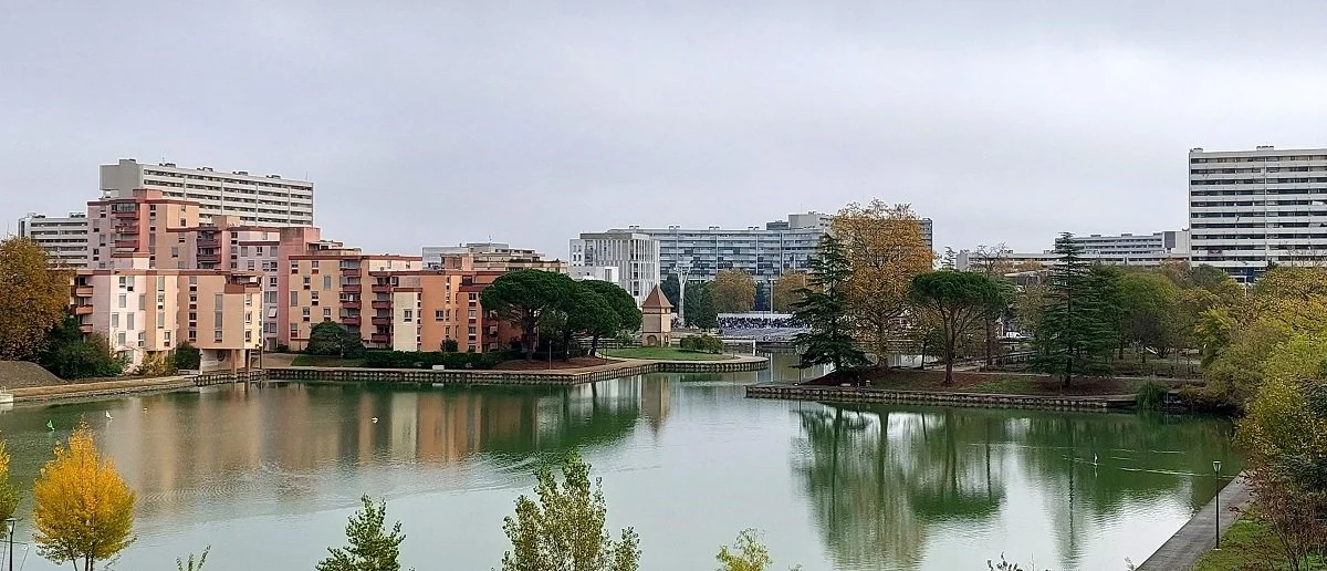 A pigeonnier, or dovecote, is surrounded by the modern buildings of Reynerie in Toulouse.