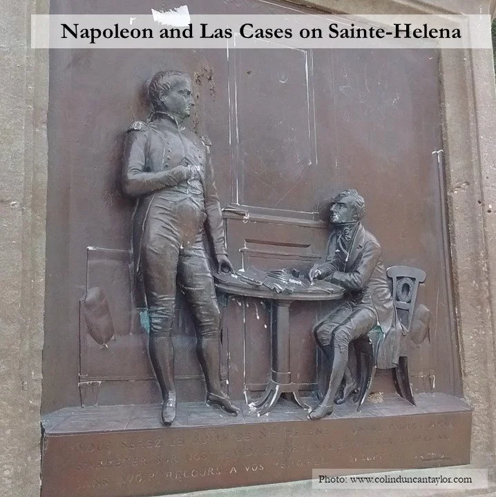 This plaque on one side of a memorial obelisk in Lavaur shows Napoleon and Las Cases on the island of Sainte-Helena.