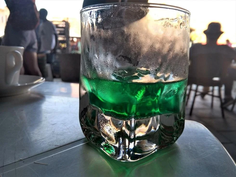 A glass of the green liqueur from Revel called Pippermint Get.