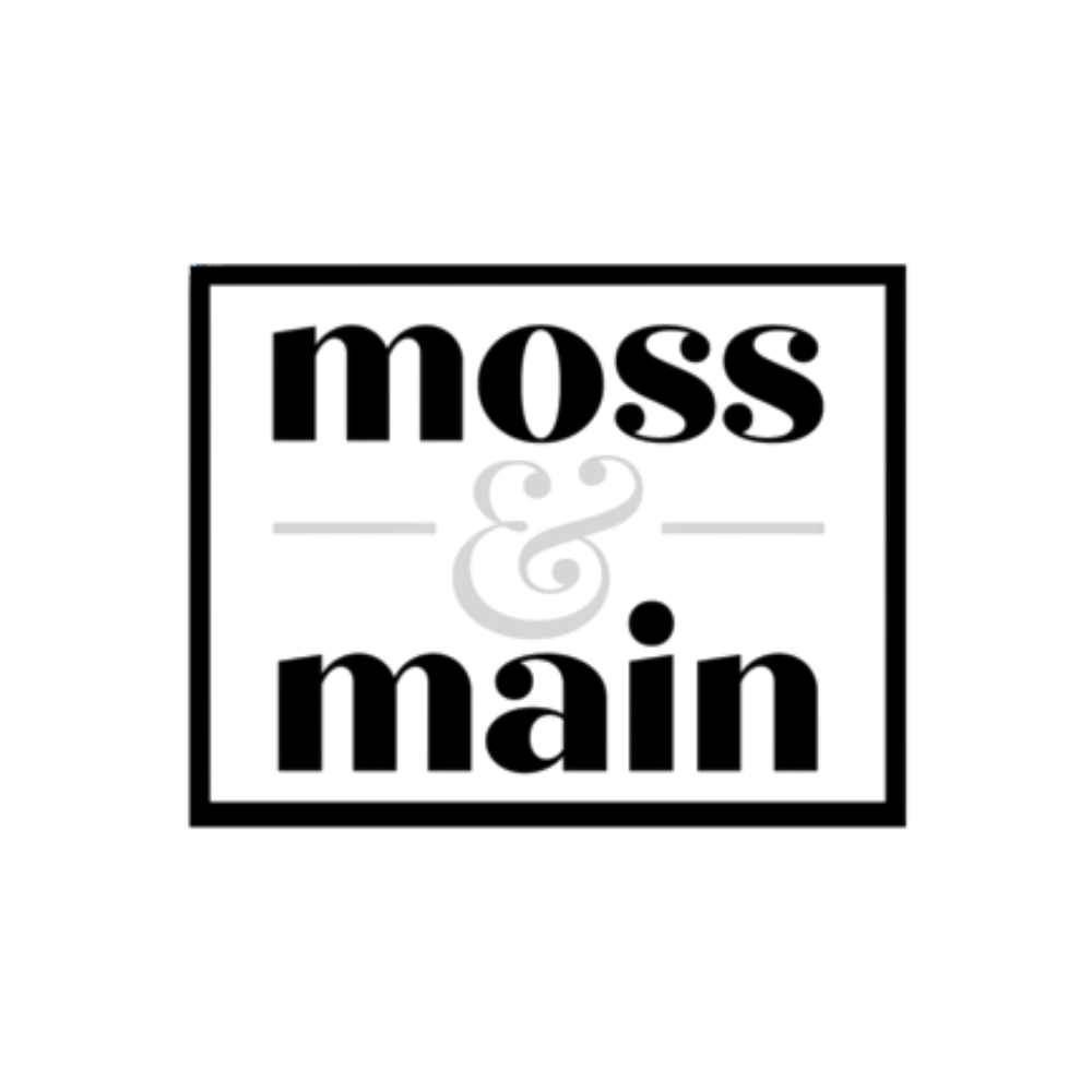 Logo with the text 'moss & main' in bold black font inside a black square outline.