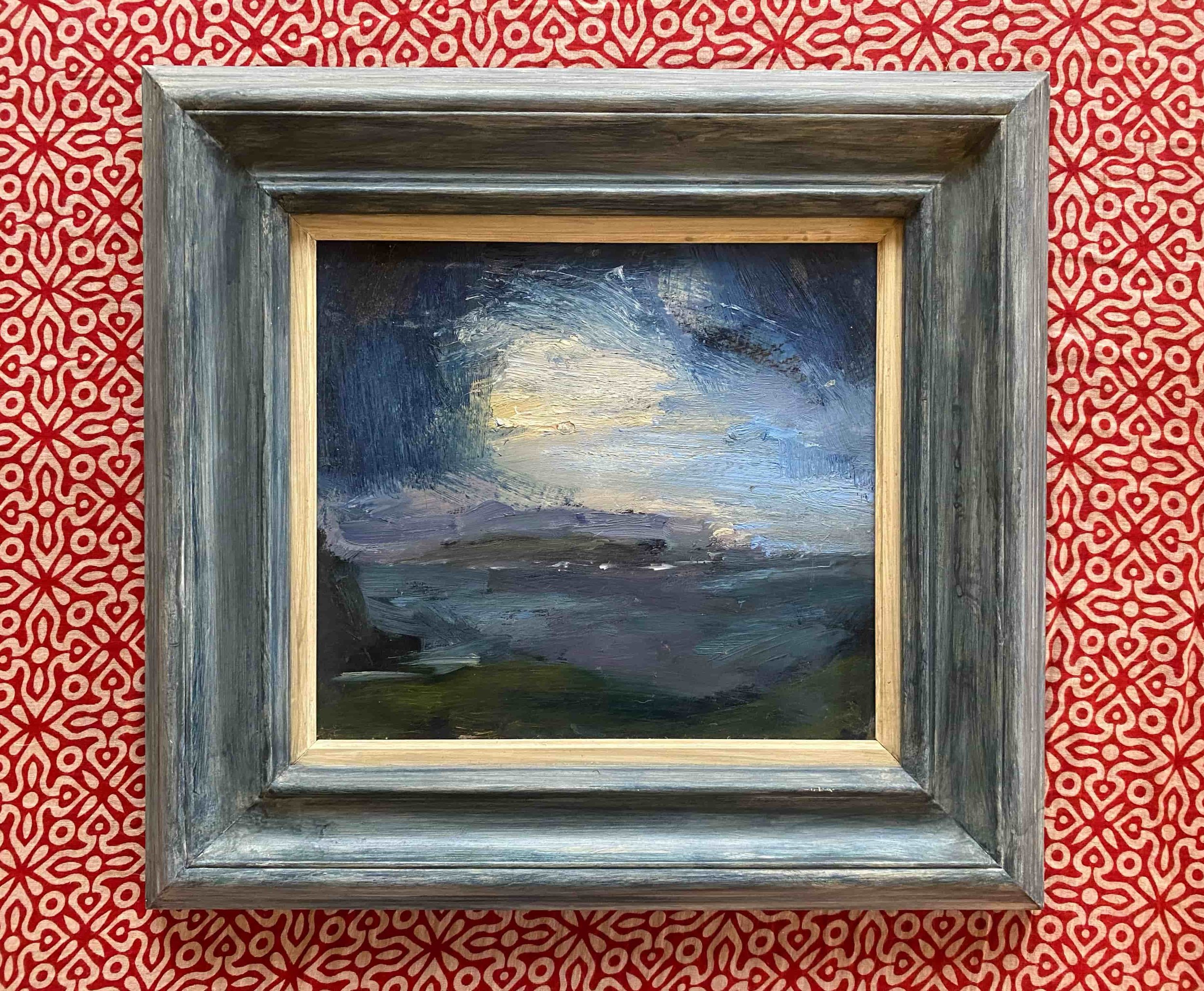 A wooden picture frame on red patterned wallpaper. The painting inside the frame is largely obscured, showing abstract brushstrokes in dark and light colors.